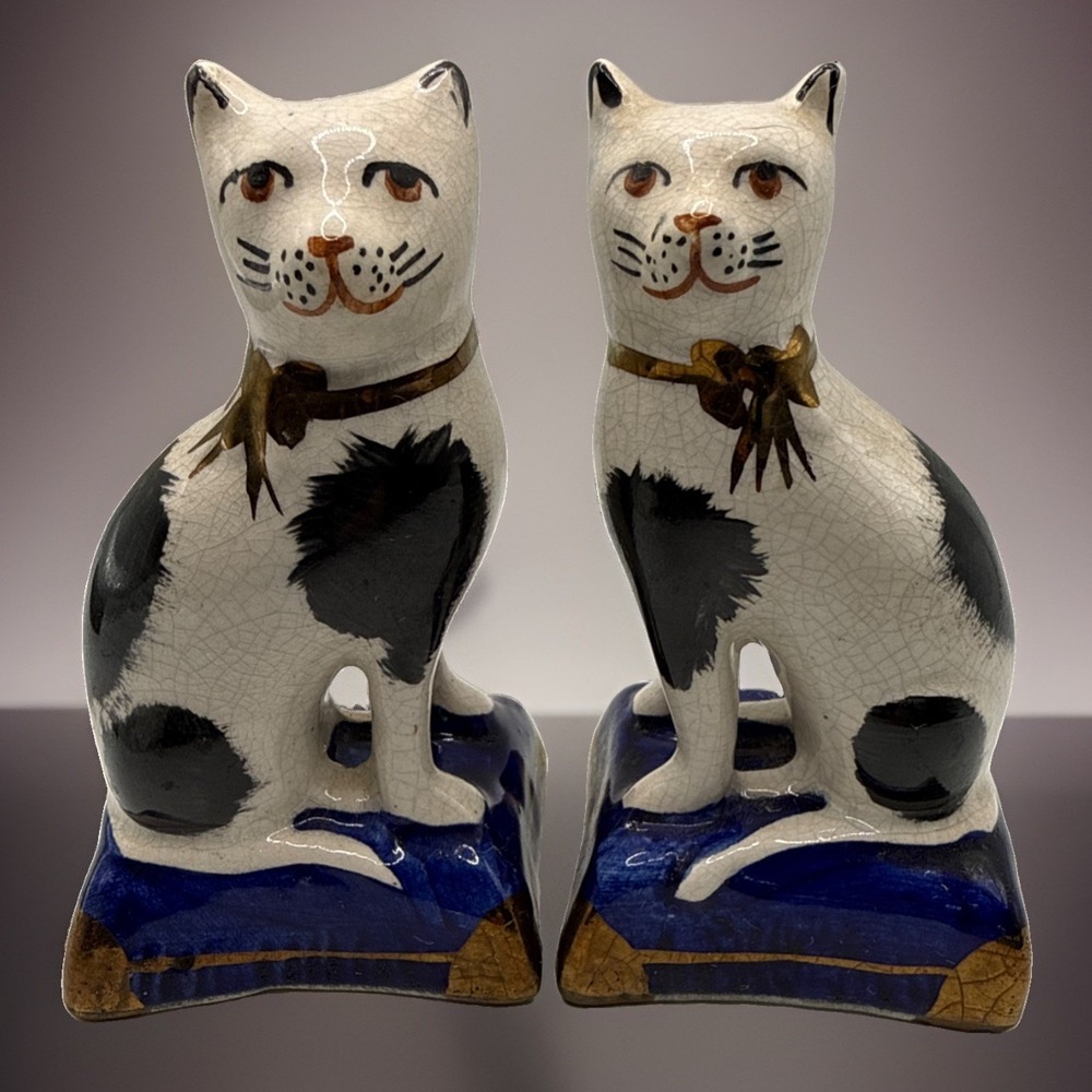 Staffordshire cat pair blue base made in England